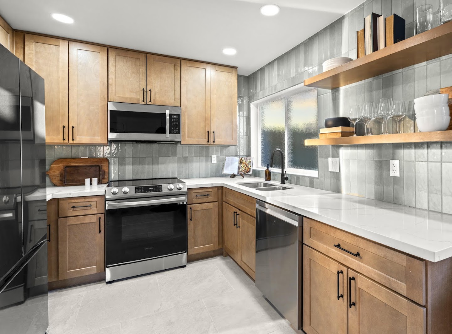 Natural maple shaker kitchen with gray tile backsplash and open shelving